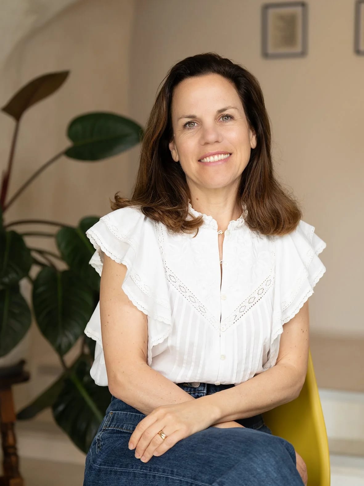 Sophie Klose smiling warmly in a calm office setting